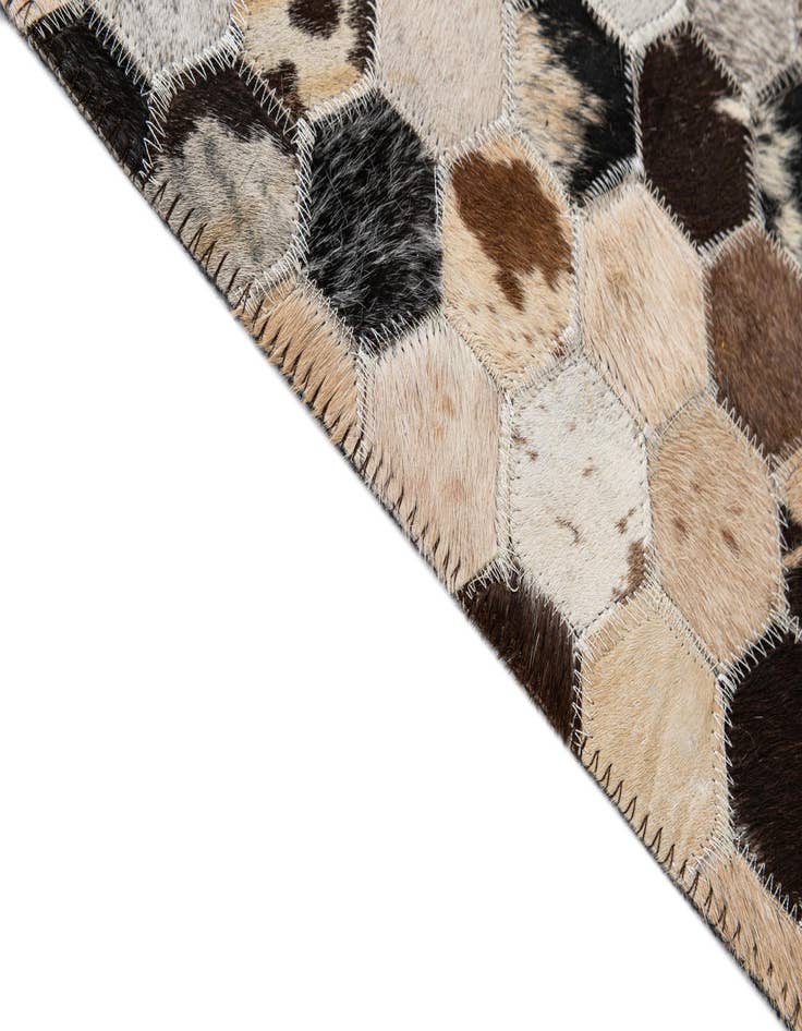 Detail image of  5' x 7' 11 Cowhide - Patchwork Rug