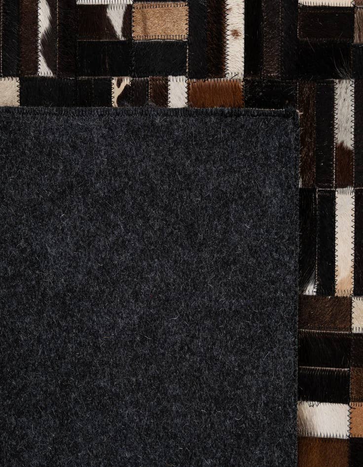 Detail image of  5' 1 x 8' Cowhide - Patchwork Rug