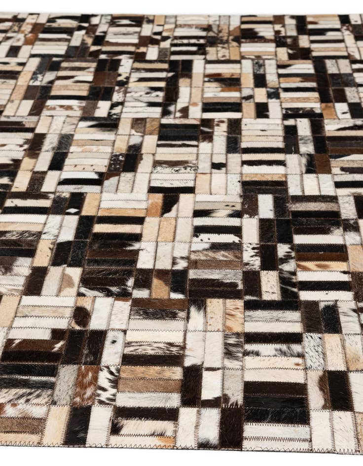 Detail image of  4' 11 x 7' 10 Cowhide - Patchwork Rug