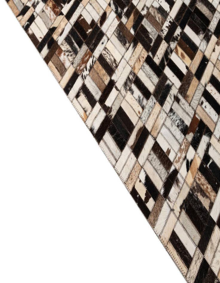 Detail image of  4' 11 x 7' 10 Cowhide - Patchwork Rug
