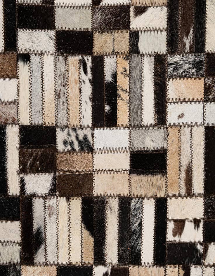 Detail image of  4' 11 x 7' 10 Cowhide - Patchwork Rug