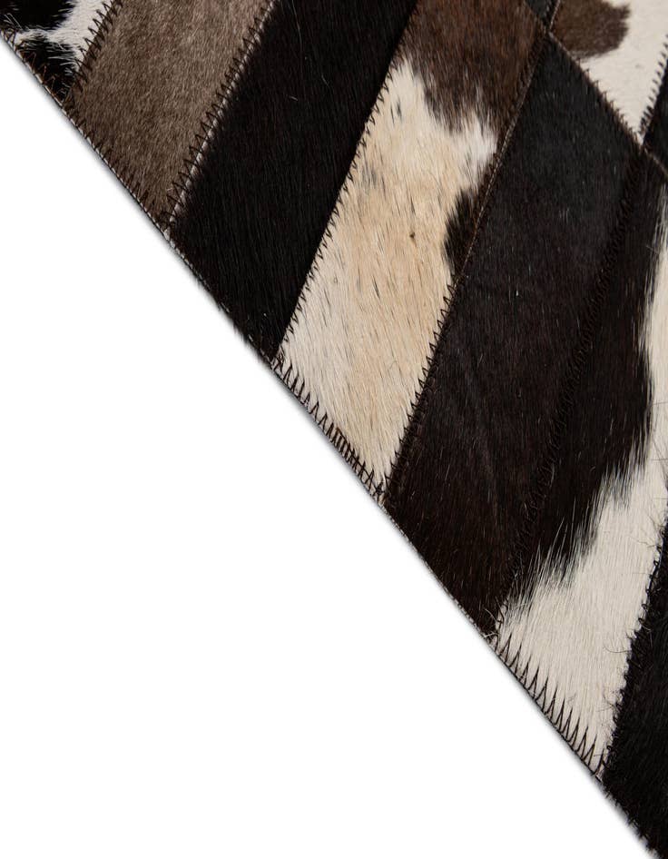 Detail image of  4' 11 x 8' Cowhide - Patchwork Rug