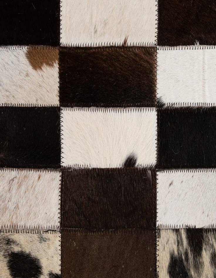 Detail image of  4' 11 x 8' Cowhide - Patchwork Rug