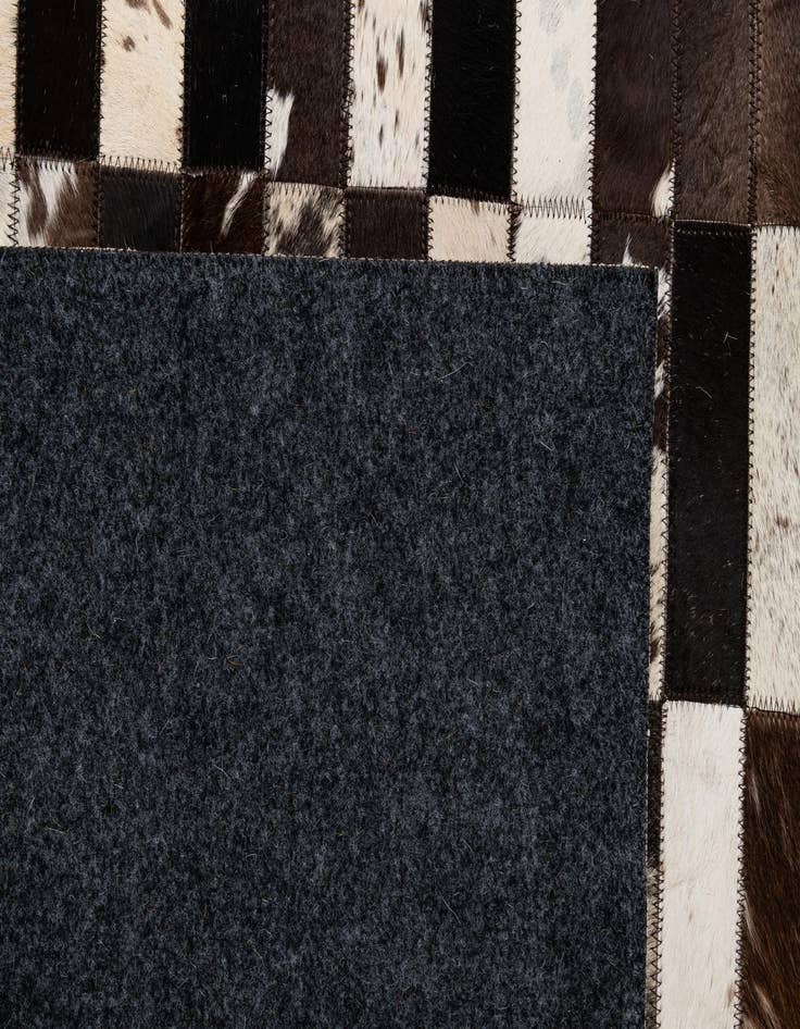Detail image of  4' 11 x 8' Cowhide - Patchwork Rug
