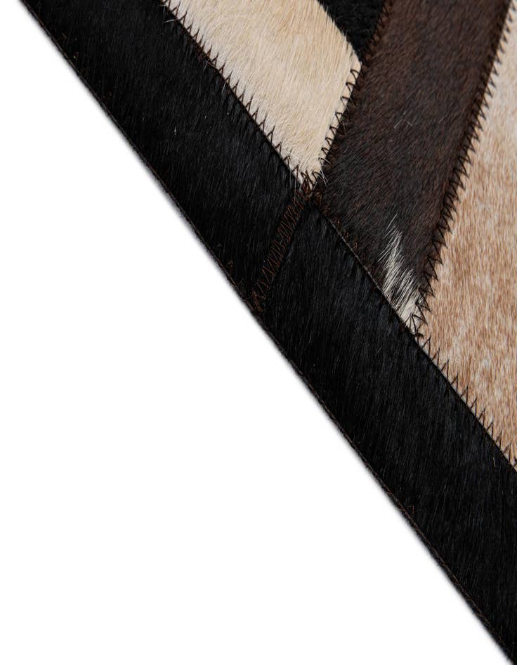 Detail image of  5' 2 x 8' Cowhide - Patchwork Rug