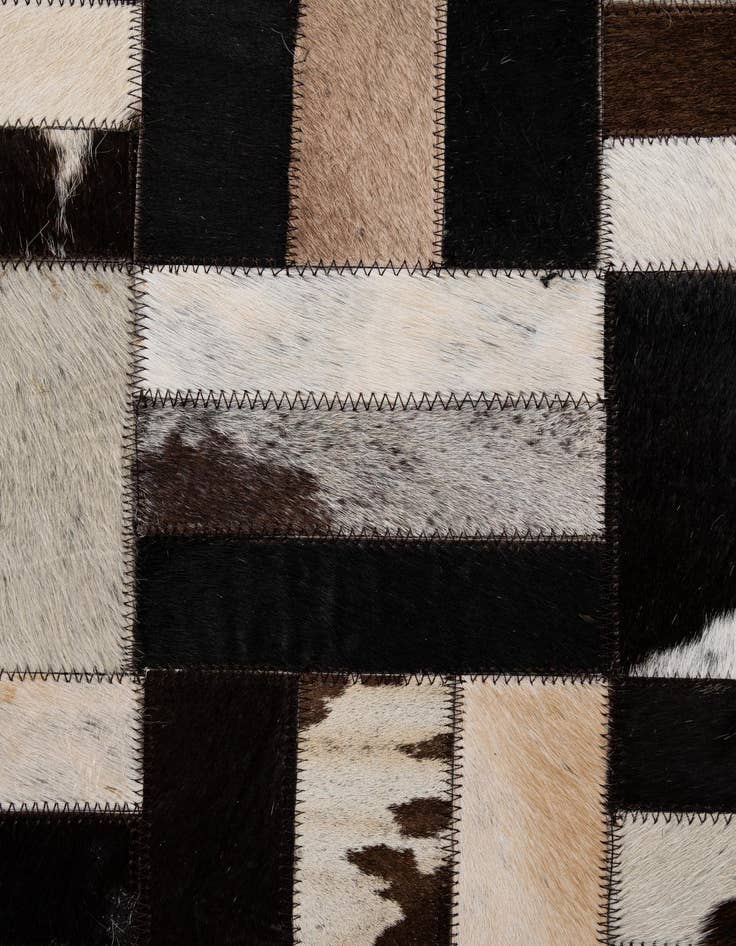 Detail image of  5' 2 x 8' Cowhide - Patchwork Rug