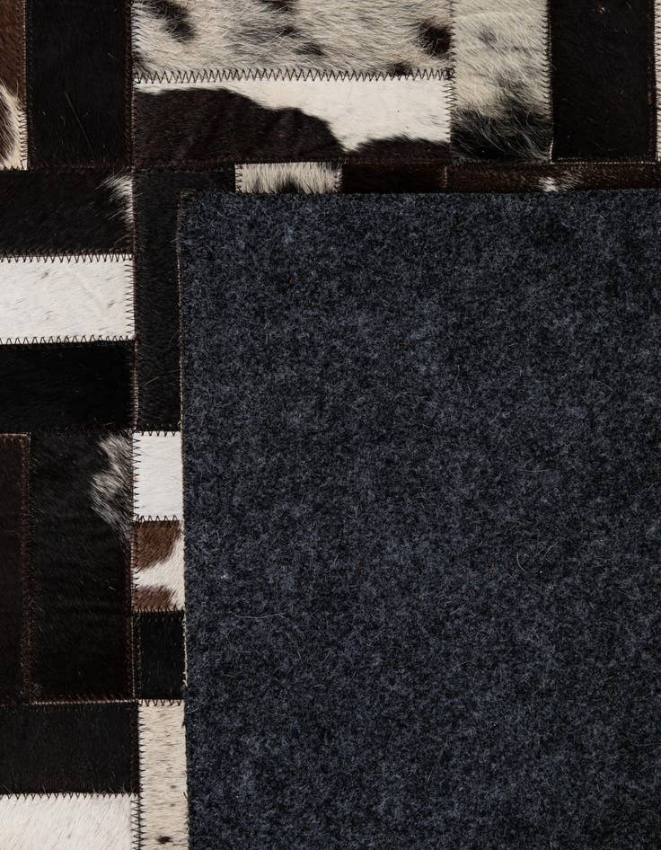 Detail image of  5' 2 x 8' Cowhide - Patchwork Rug
