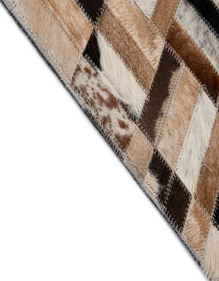 Detail image of  5' 1 x 8' Cowhide - Patchwork Rug
