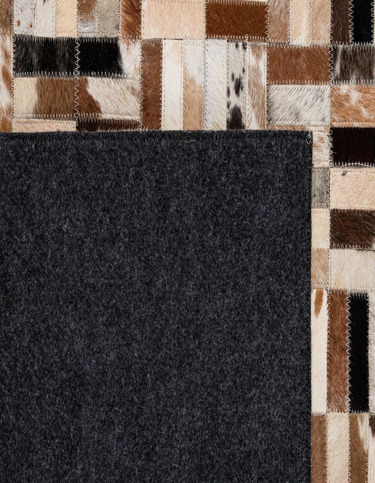 Detail image of  5' 1 x 8' Cowhide - Patchwork Rug