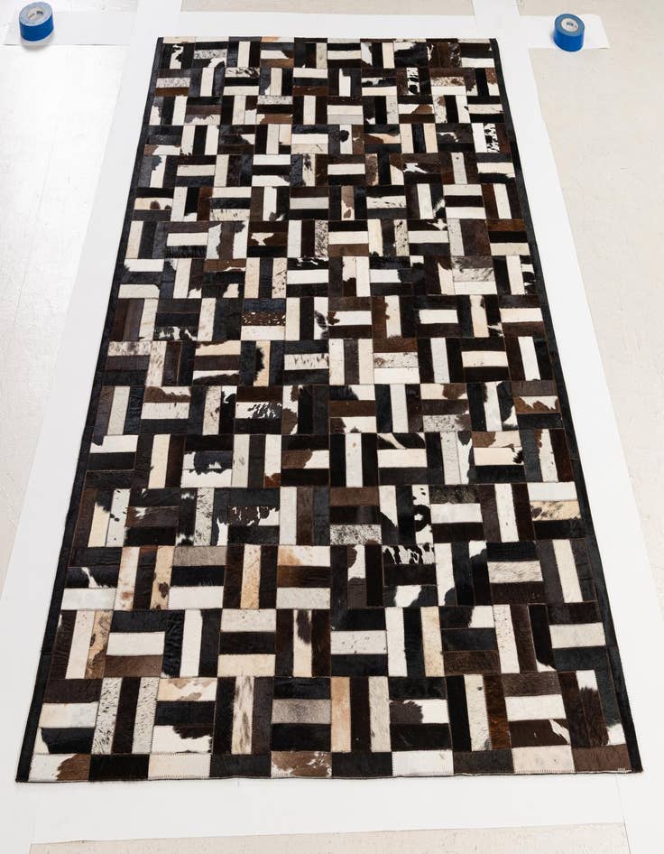 Detail image of  5' 1 x 7' 11 Cowhide - Patchwork Rug