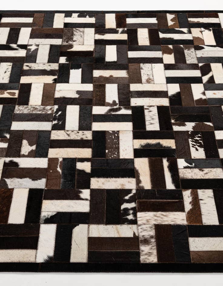 Detail image of  5' 1 x 7' 11 Cowhide - Patchwork Rug