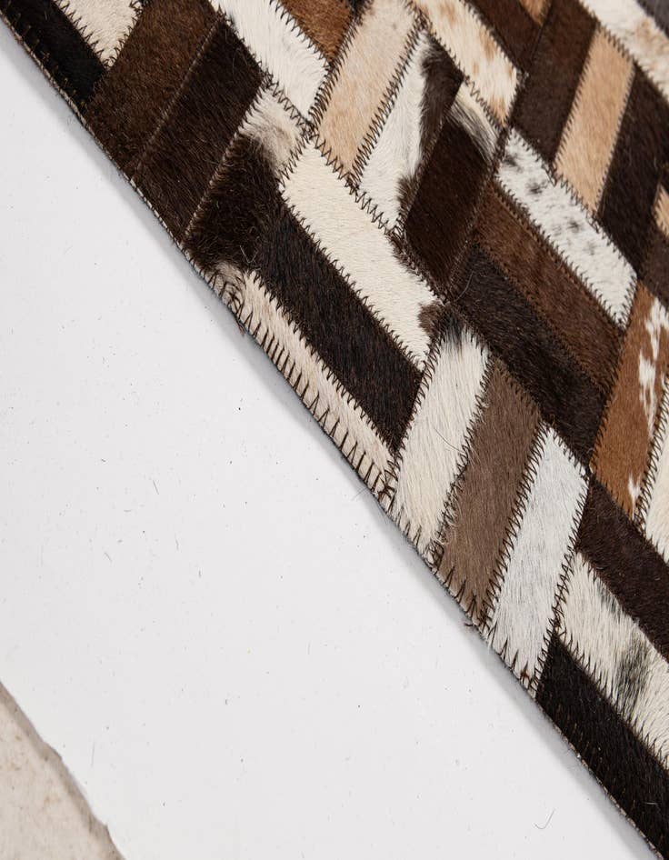 Detail image of  4' 11 x 7' 11 Cowhide - Patchwork Rug