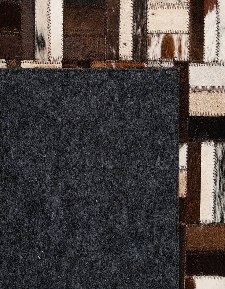 Detail image of  4' 11 x 7' 11 Cowhide - Patchwork Rug