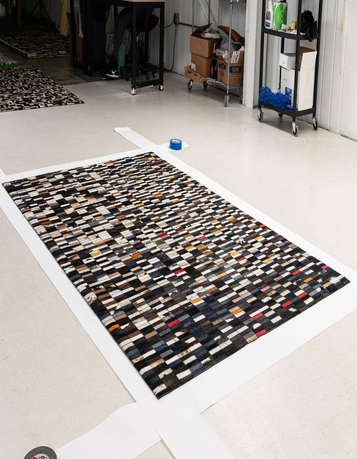 Detail image of  5' 2 x 7' 11 Cowhide - Patchwork Rug