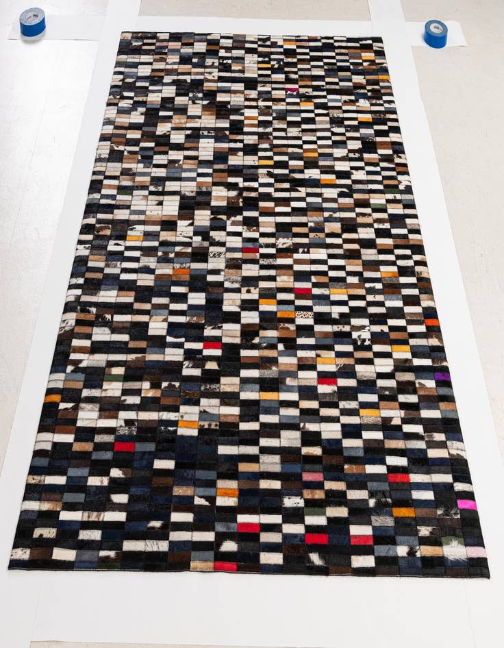 Detail image of  5' 2 x 7' 11 Cowhide - Patchwork Rug