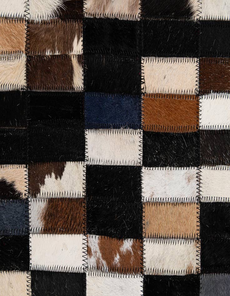Detail image of  5' 2 x 7' 11 Cowhide - Patchwork Rug