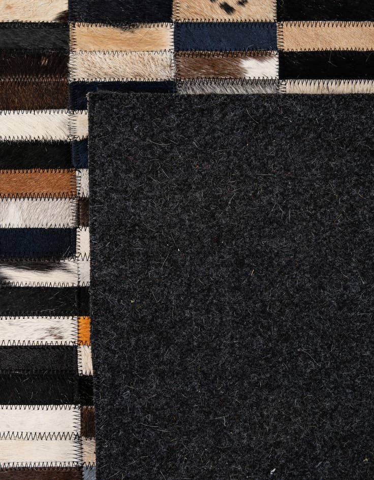 Detail image of  5' 2 x 7' 11 Cowhide - Patchwork Rug
