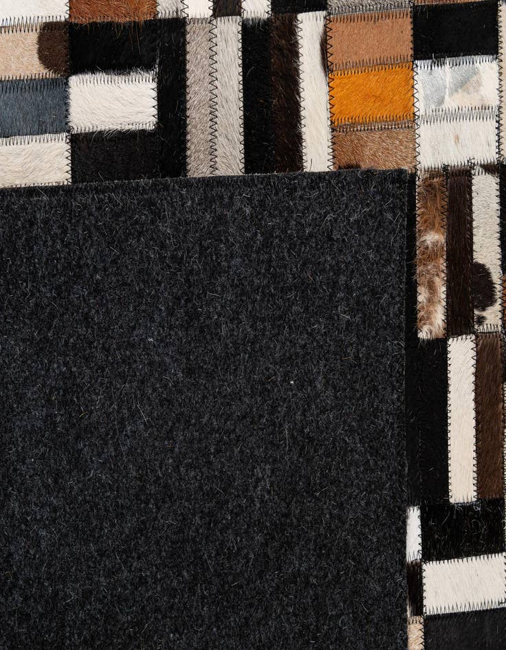 Detail image of  5' 1 x 8' Cowhide - Patchwork Rug