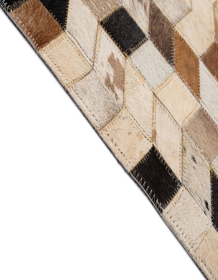 Detail image of  5' x 7' 11 Cowhide - Patchwork Rug