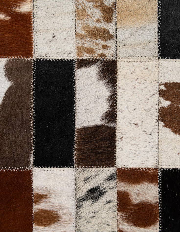 Detail image of  5' 2 x 7' 11 Cowhide - Patchwork Rug