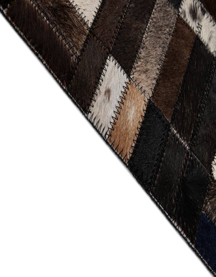 Detail image of  5' 1 x 8' 1 Cowhide - Patchwork Rug