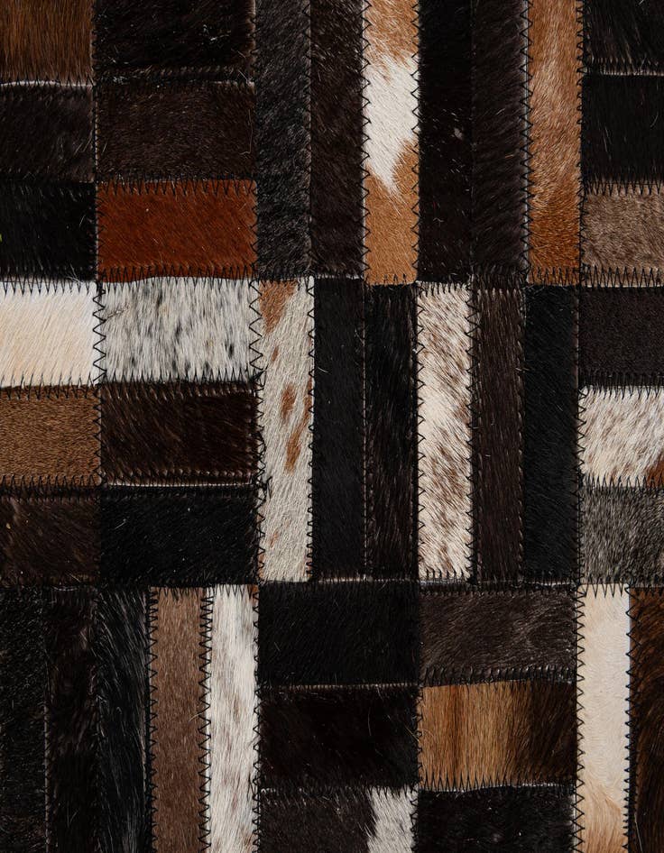 Detail image of  5' 1 x 8' 1 Cowhide - Patchwork Rug
