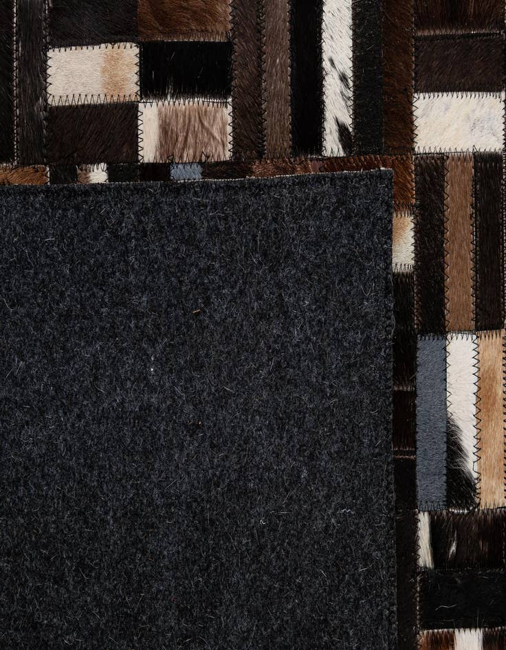 Detail image of  5' 1 x 8' 1 Cowhide - Patchwork Rug