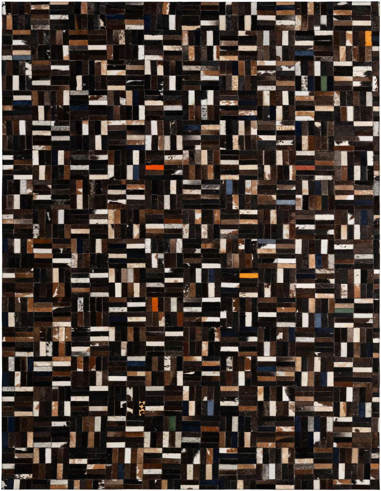 A 5x8 rectangular Cowhide Patchwork rug featuring a modern stripe pattern in multi-colored natural cowhide and leather.