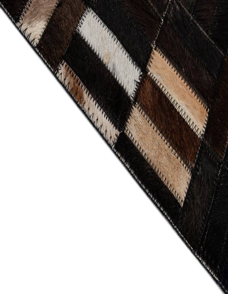 Detail image of  5' 1 x 8' Cowhide - Patchwork Rug