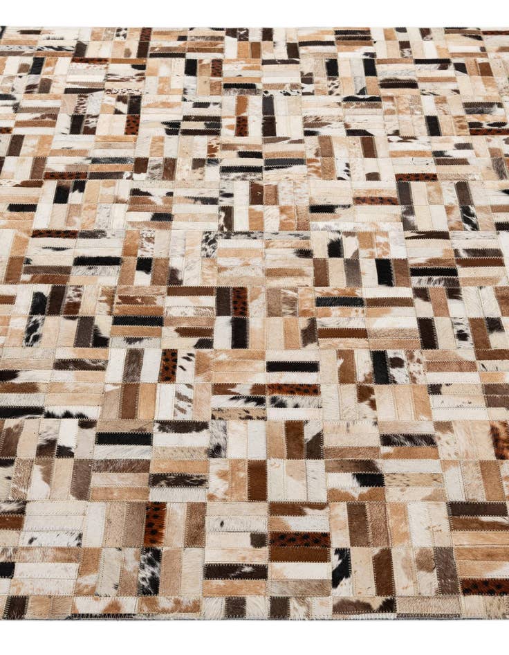Detail image of  5' 1 x 7' 11 Cowhide - Patchwork Rug