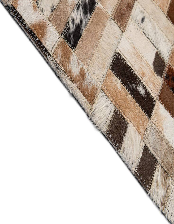 Detail image of  5' 1 x 7' 11 Cowhide - Patchwork Rug