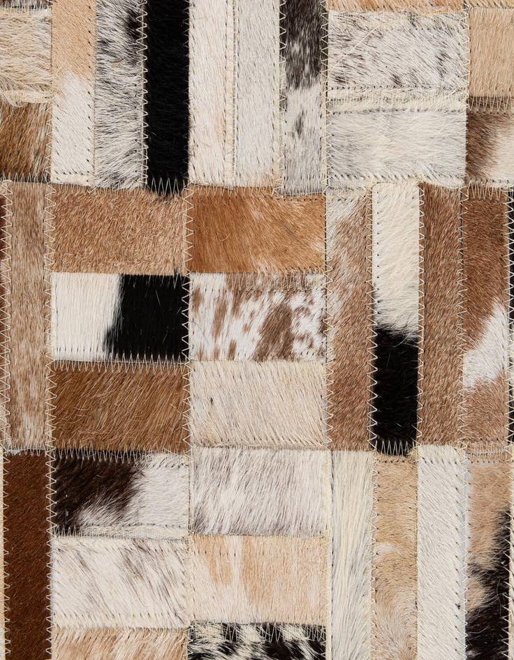 Detail image of  5' 1 x 7' 11 Cowhide - Patchwork Rug