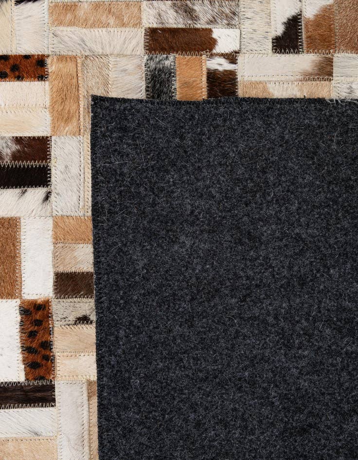 Detail image of  5' 1 x 7' 11 Cowhide - Patchwork Rug