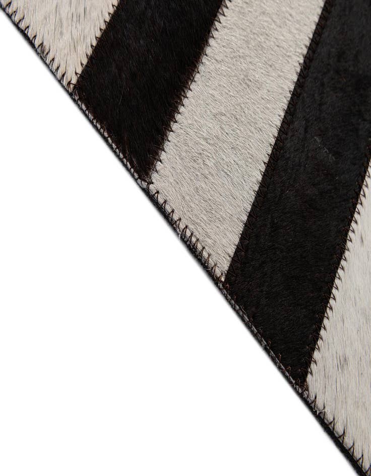 Detail image of  4' 11 x 7' 11 Cowhide - Patchwork Rug