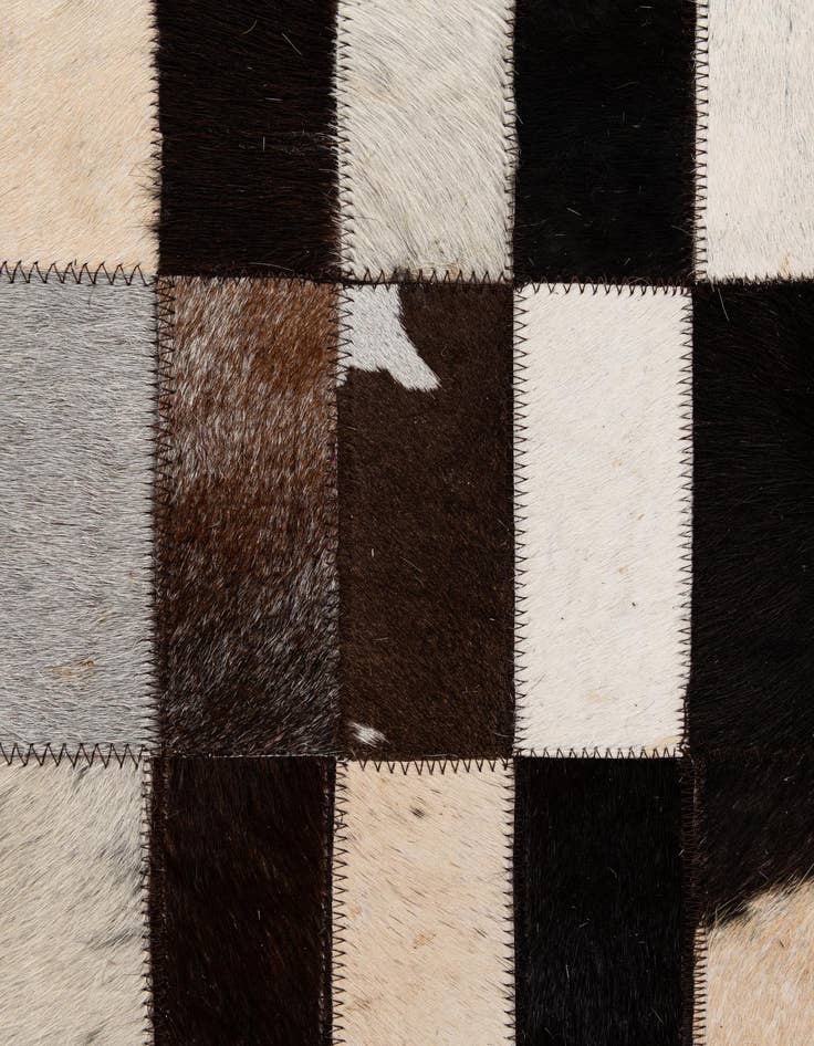 Detail image of  4' 11 x 7' 11 Cowhide - Patchwork Rug