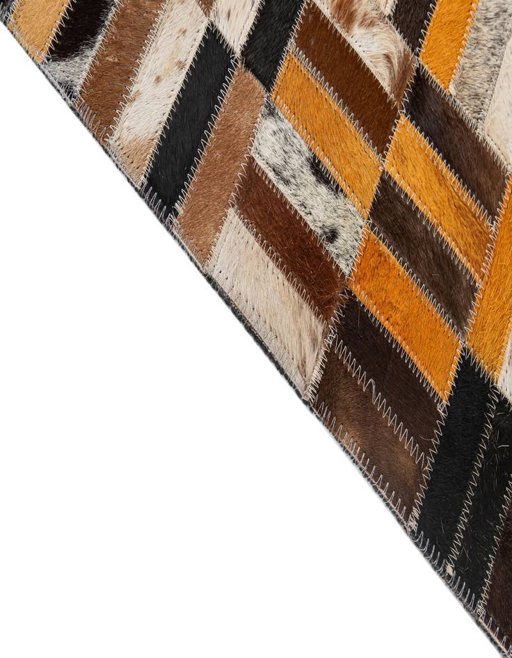 Detail image of  4' 11 x 7' 10 Cowhide - Patchwork Rug