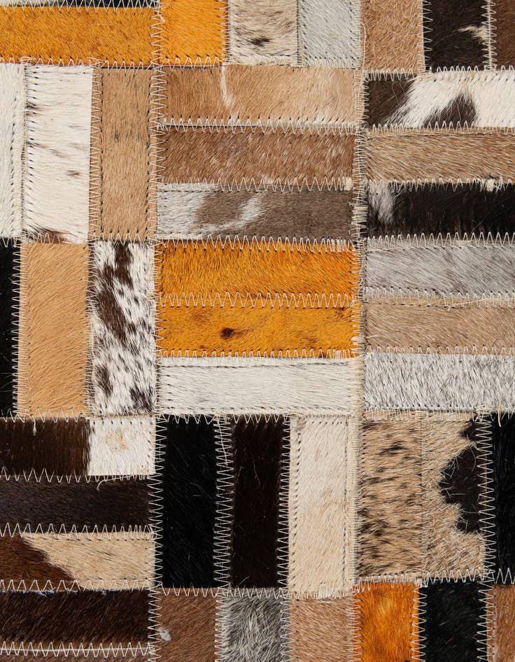 Detail image of  4' 11 x 7' 10 Cowhide - Patchwork Rug