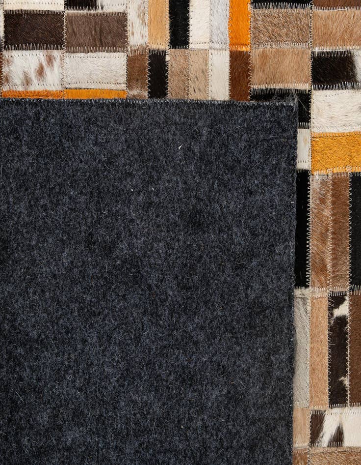 Detail image of  4' 11 x 7' 10 Cowhide - Patchwork Rug