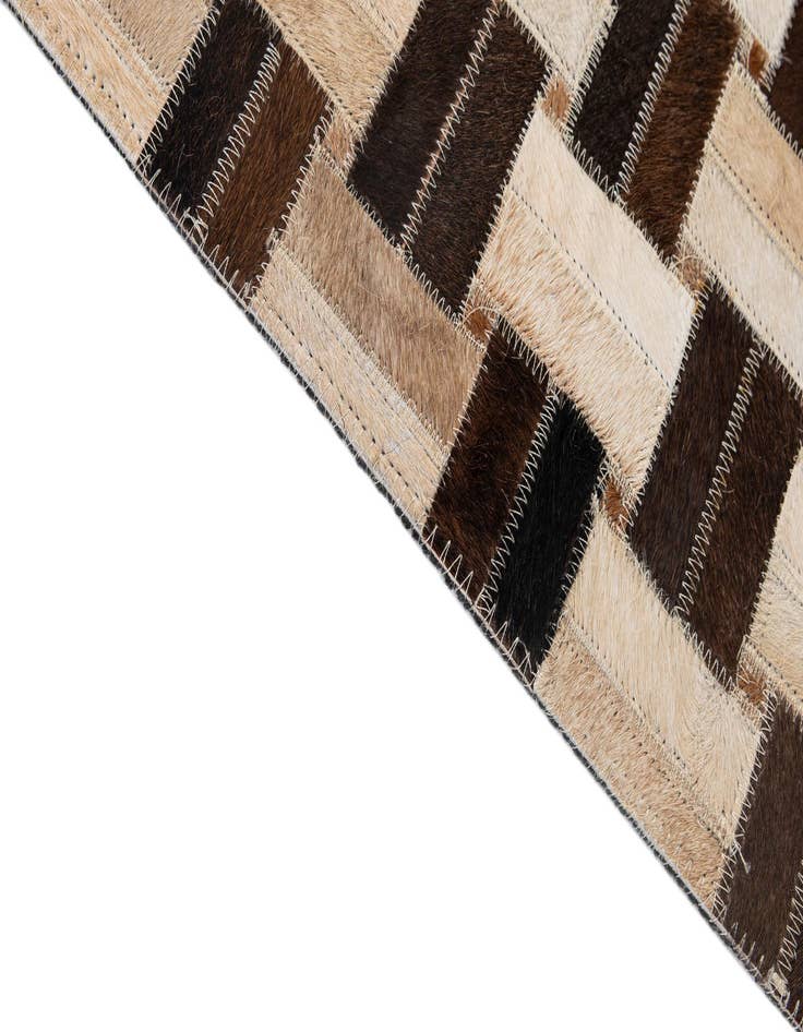 Detail image of  4' 11 x 7' 10 Cowhide - Patchwork Rug