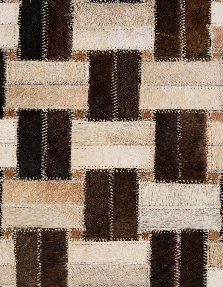 Detail image of  4' 11 x 7' 10 Cowhide - Patchwork Rug