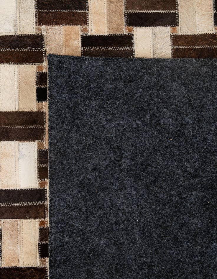 Detail image of  4' 11 x 7' 10 Cowhide - Patchwork Rug