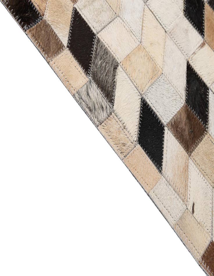 Detail image of  5' x 7' 11 Cowhide - Patchwork Rug