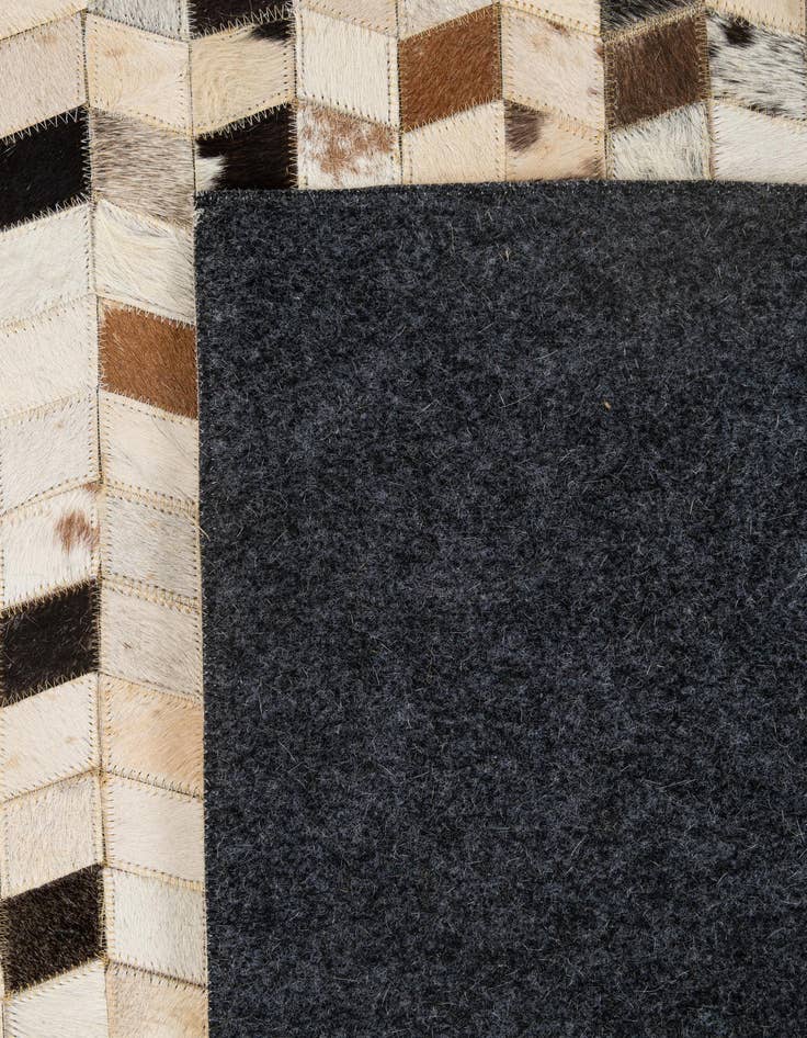 Detail image of  5' x 7' 11 Cowhide - Patchwork Rug