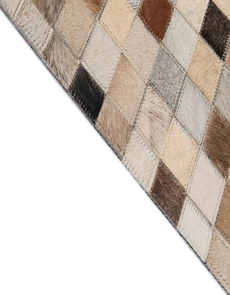 Detail image of  5' x 7' 11 Cowhide - Patchwork Rug