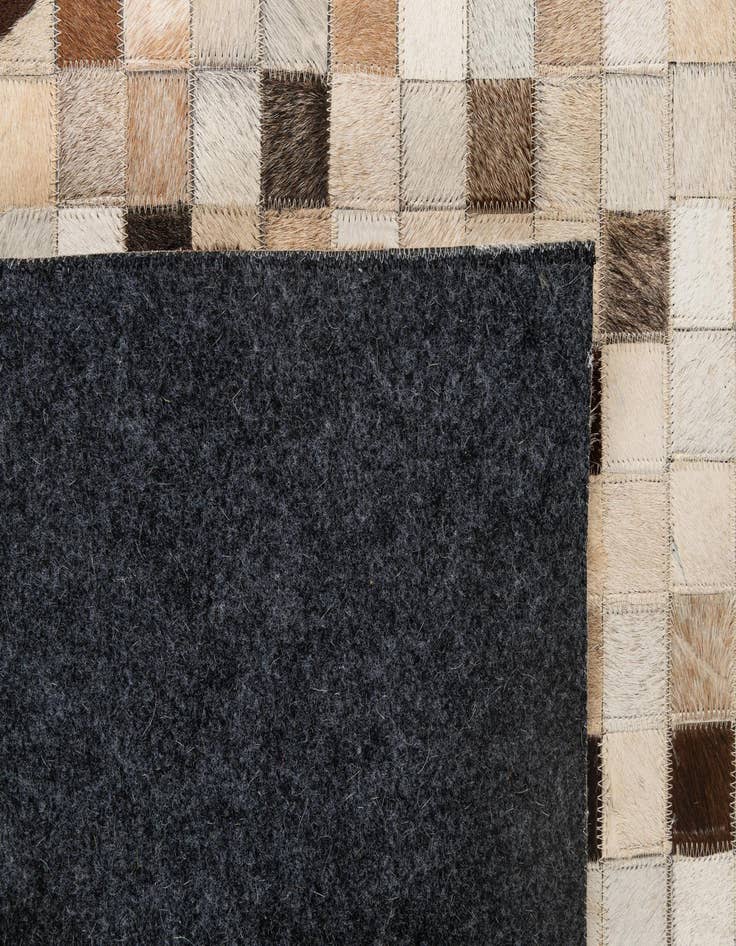 Detail image of  5' x 7' 11 Cowhide - Patchwork Rug