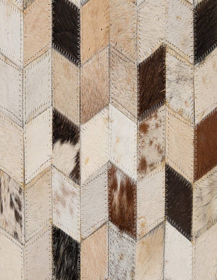 Detail image of  5' 1 x 7' 10 Cowhide - Patchwork Rug
