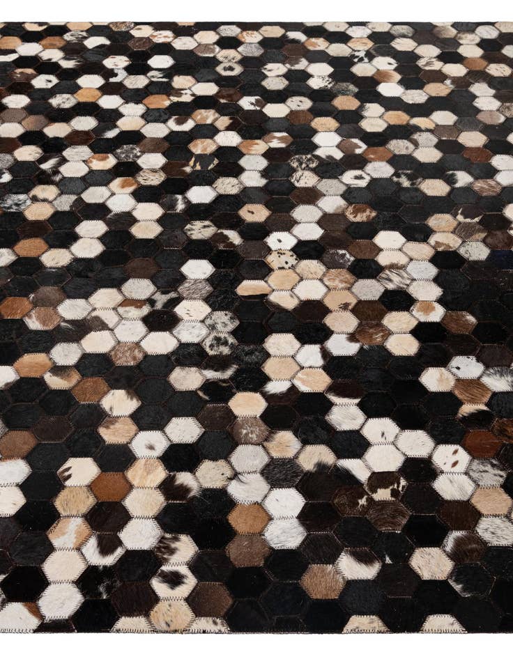 Detail image of  5' 1 x 7' 11 Cowhide - Patchwork Rug