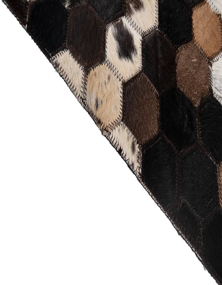 Detail image of  5' 1 x 7' 11 Cowhide - Patchwork Rug