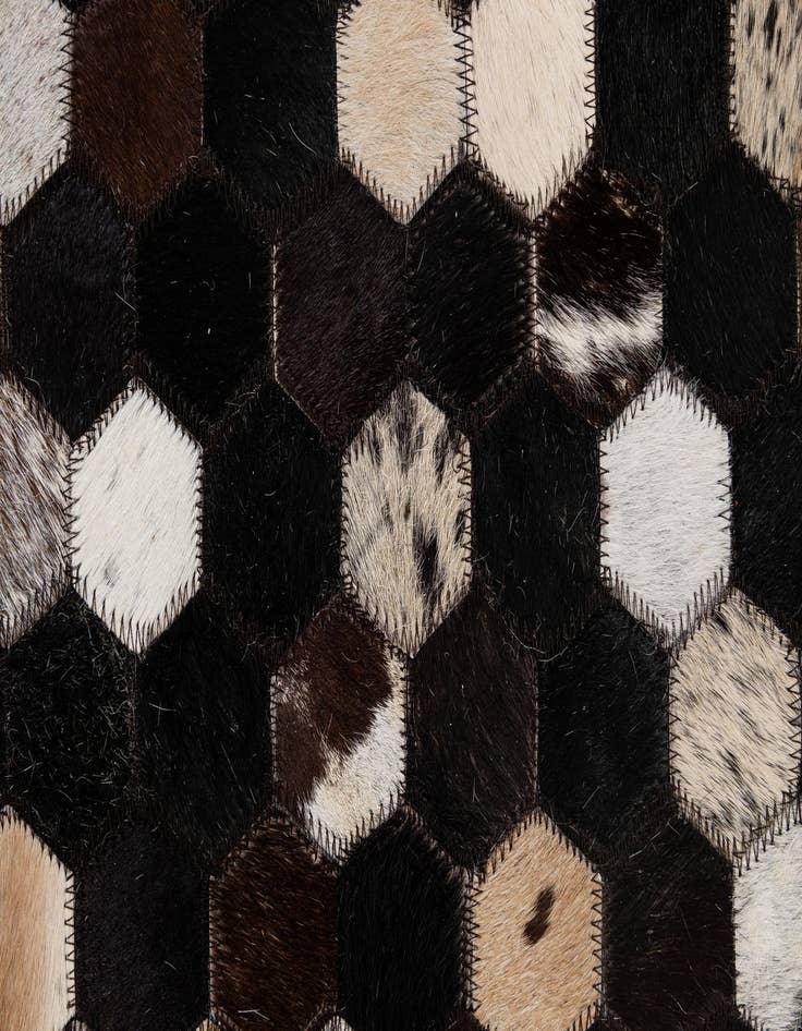 Detail image of  5' 1 x 7' 11 Cowhide - Patchwork Rug
