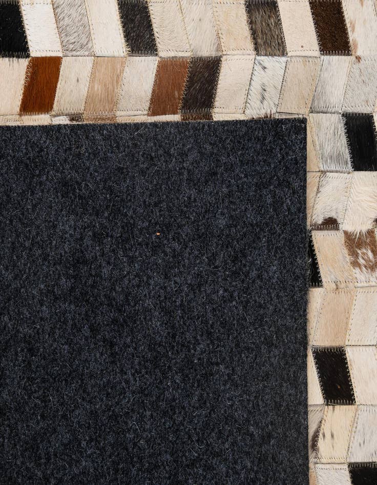 Detail image of  5' x 7' 11 Cowhide - Patchwork Rug